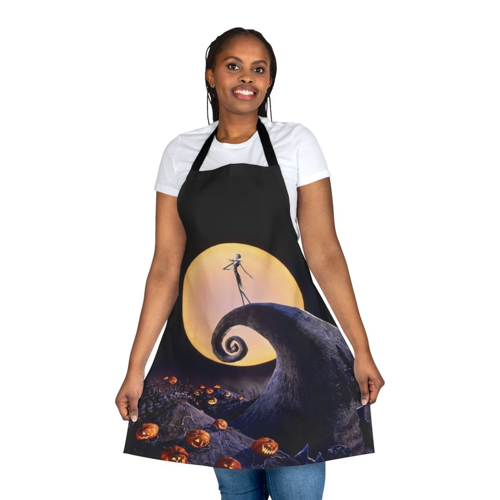 A black apron featuring the iconic characters and imagery from The Nightmare Before Christmas.