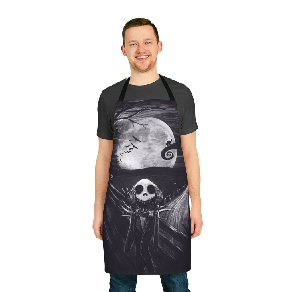 A black apron with a spooky skeletal design inspired by The Nightmare Before Christmas