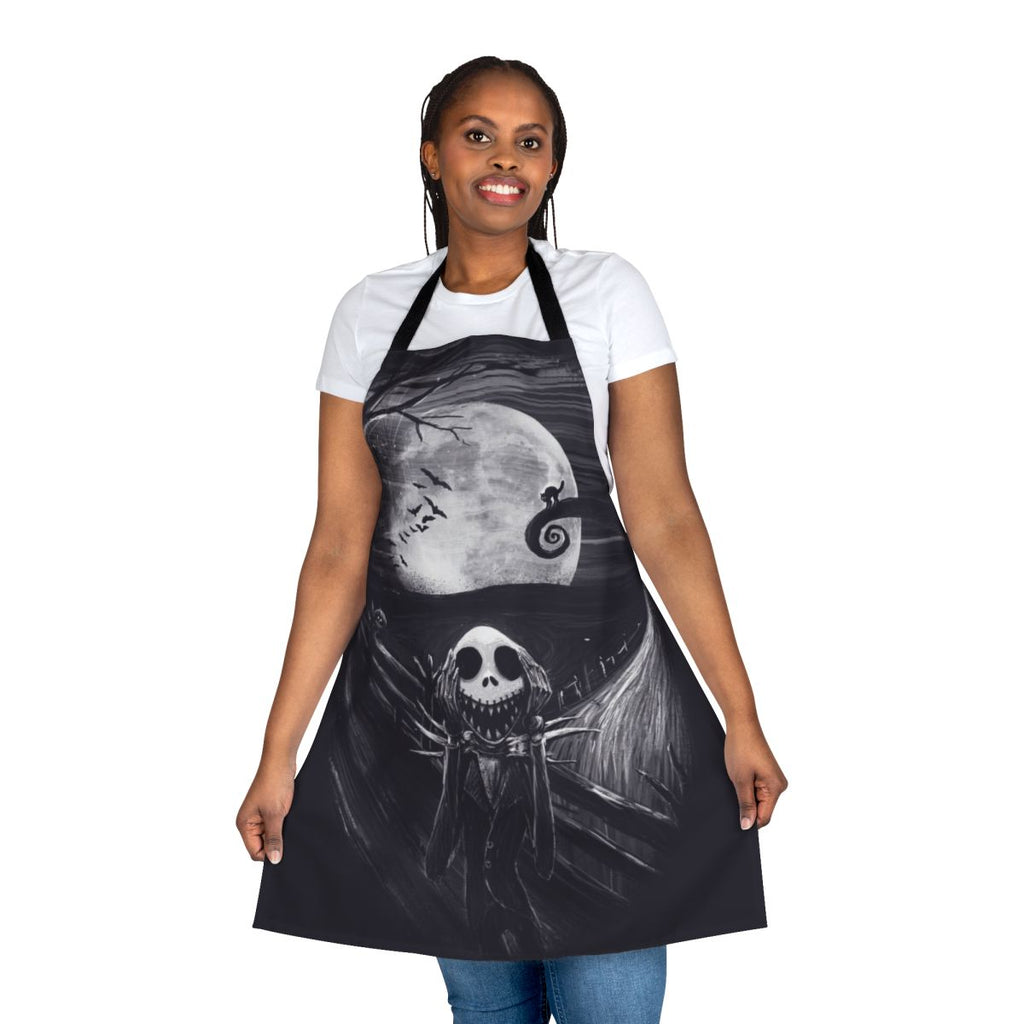 A black apron with a spooky skeletal design inspired by The Nightmare Before Christmas