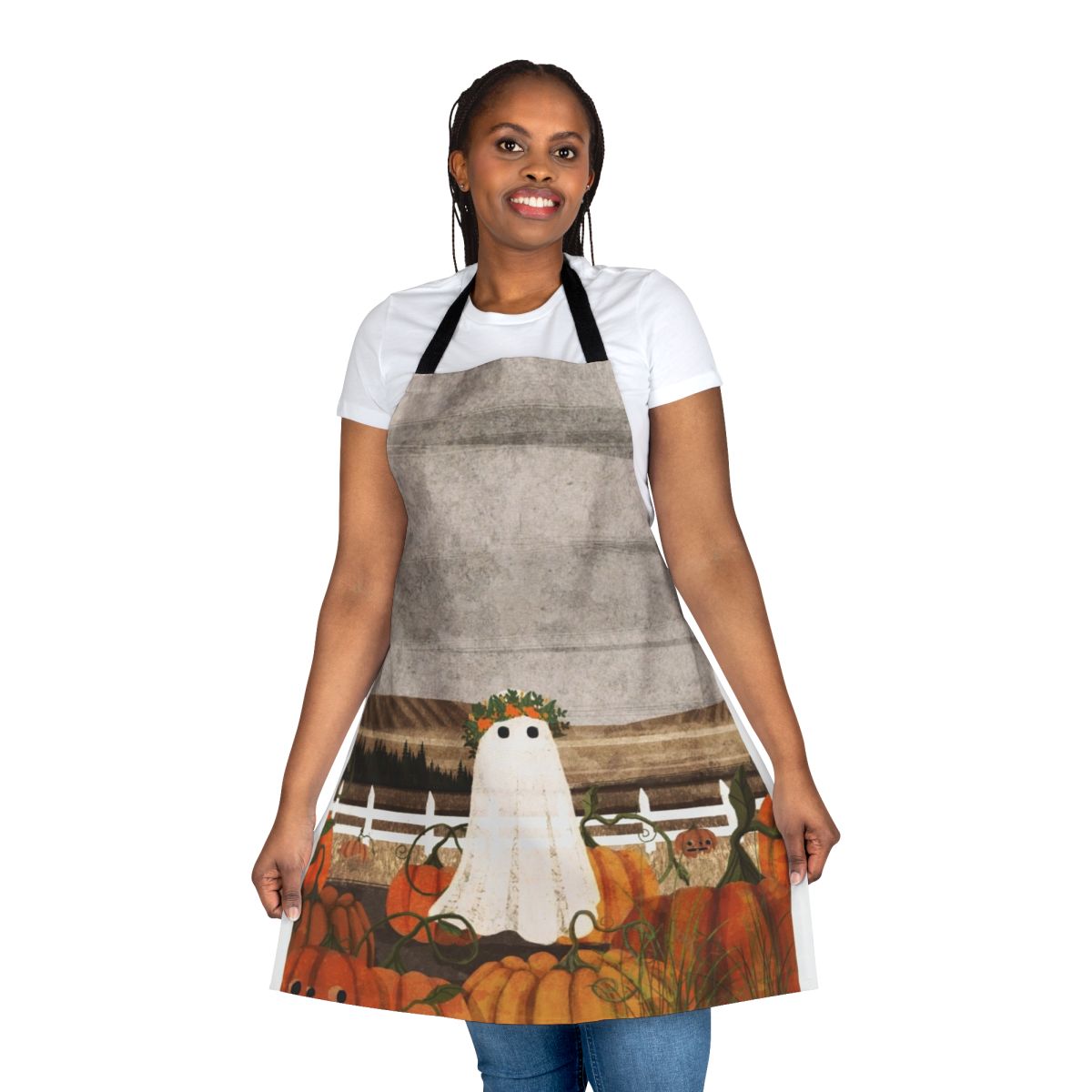 A vintage-style apron with a ghostly pumpkin patch design, perfect for fall and Halloween celebrations.