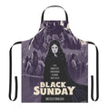 Black apron with horror movie-inspired graphics like witches, demons, and devils