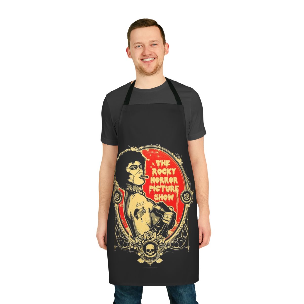 A black apron with the iconic Rocky Horror Picture Show logo and imagery