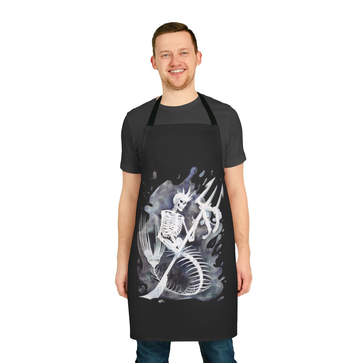 A black apron featuring a detailed mermaid skeleton design, perfect for Halloween or gothic-inspired cooking and crafting.