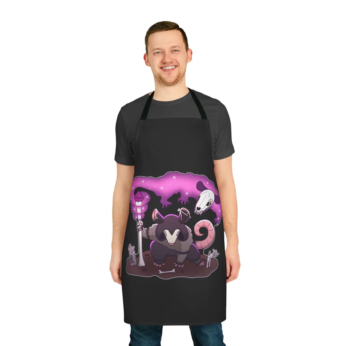 Apron featuring a necromancer opossum design with skulls and bones in dark, gothic colors