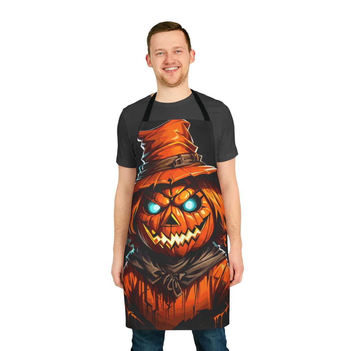 Pumpkin scarecrow design on an apron, perfect for fall and Halloween festivities.