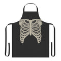 A black apron featuring a ribcage design, inspired by the Locked Tomb sci-fi fantasy series.