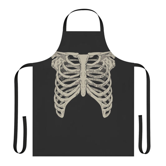 A black apron featuring a ribcage design, inspired by the Locked Tomb sci-fi fantasy series.
