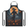 Haunting scarecrow design on a black apron under a full moon