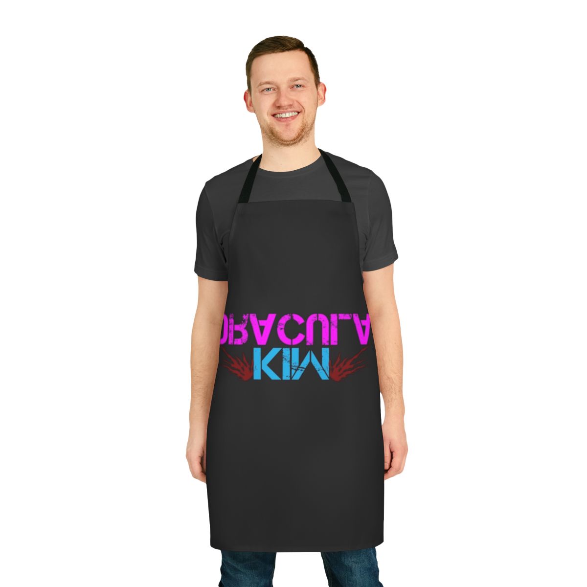 A black apron with a gothic, vampire-inspired design featuring a red and white color scheme.
