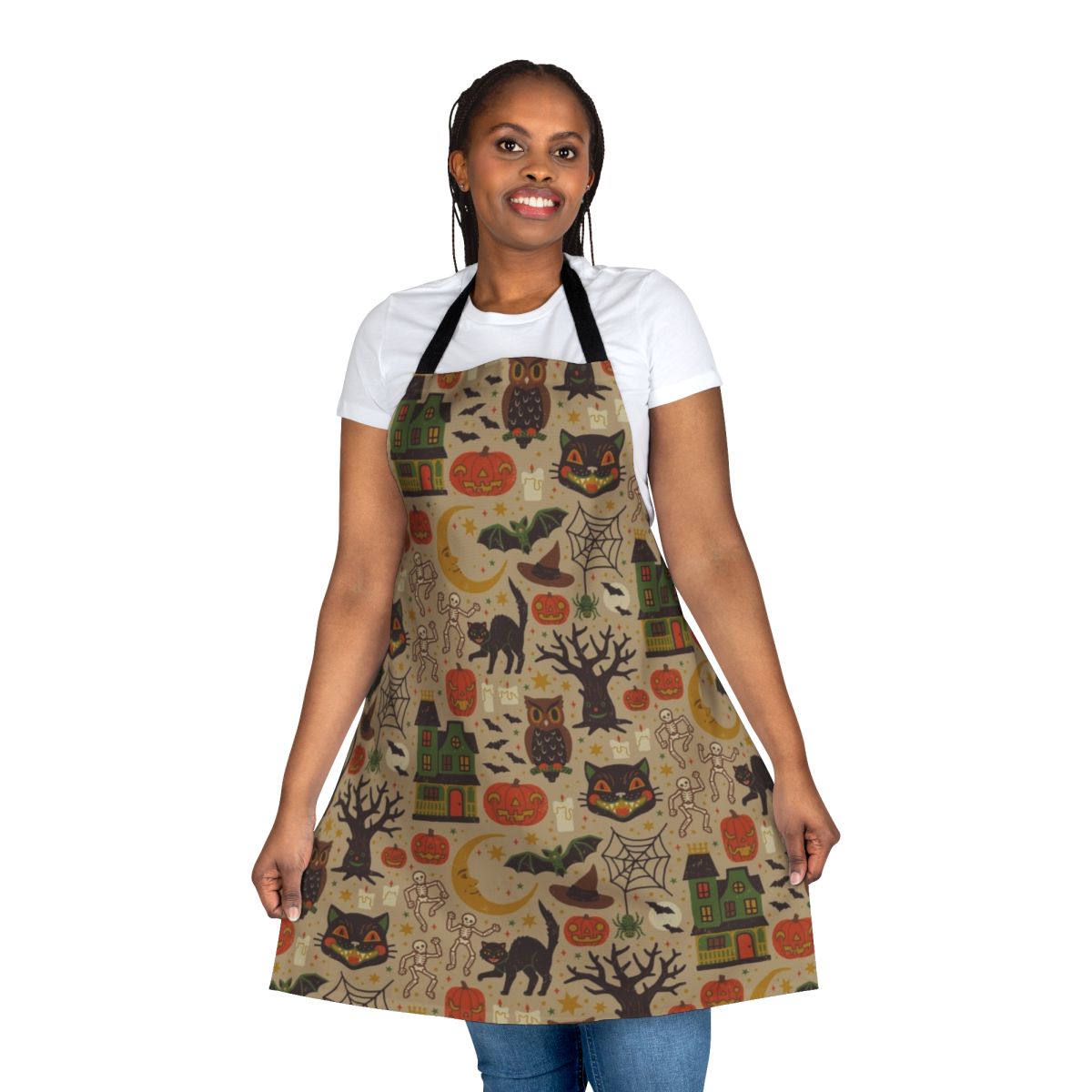 Vintage-inspired Halloween apron with black cats, pumpkins, owls, and other spooky motifs