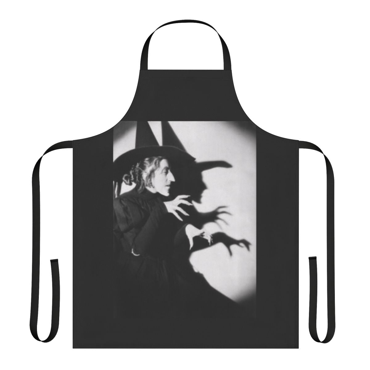 Spooky witch-themed apron with black and green design