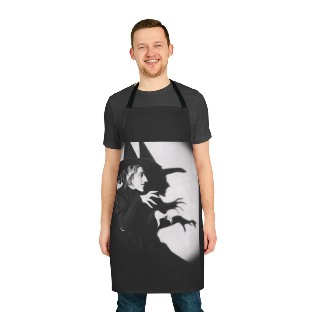 Spooky witch-themed apron with black and green design