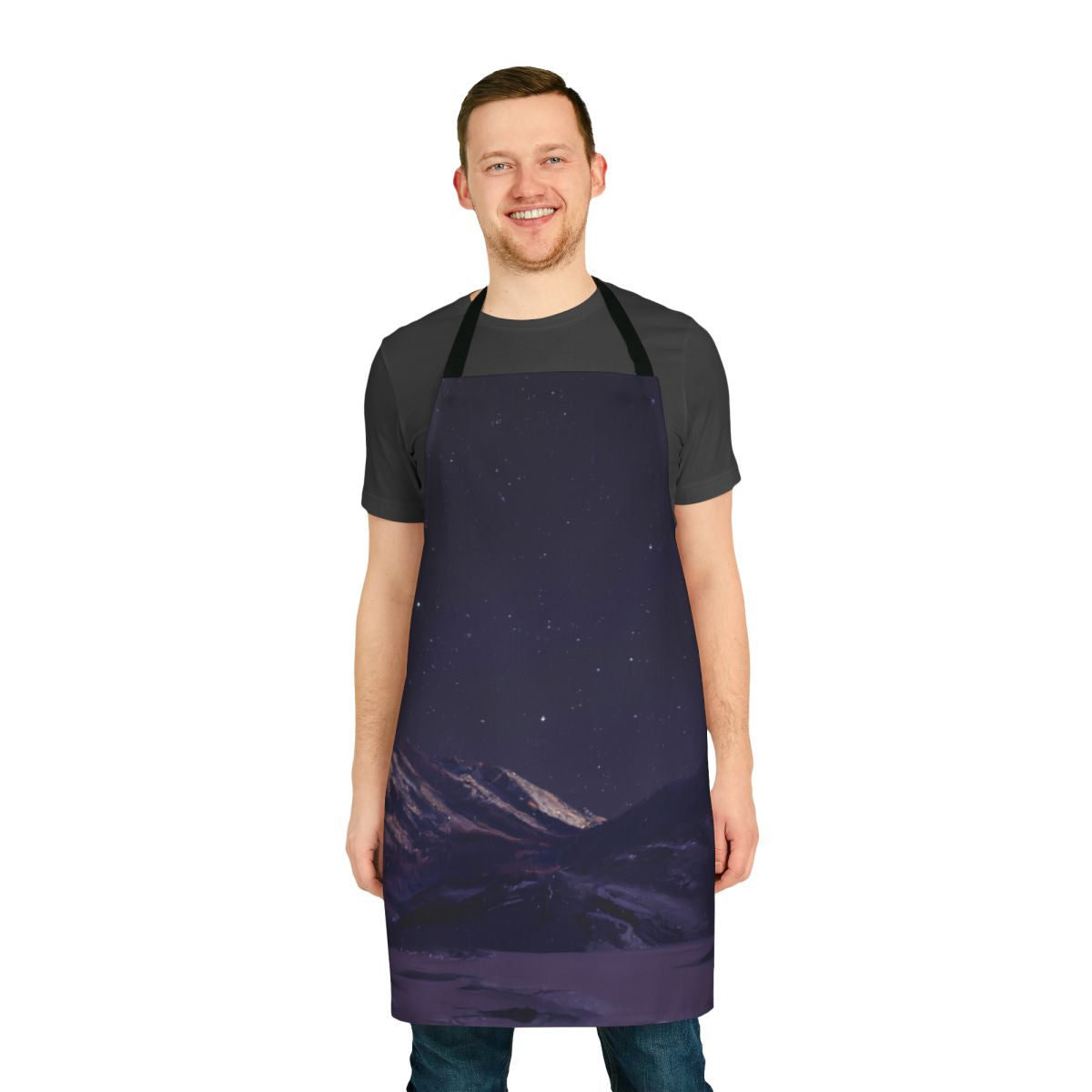 Starry night sky with mountains silhouetted in the foreground, printed on an apron
