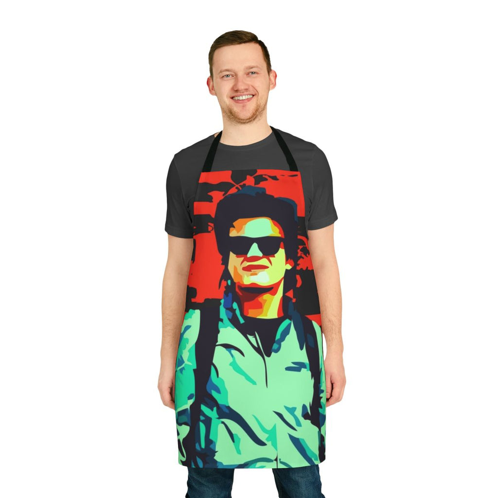 Steve Harrington character from Stranger Things Netflix series wearing an apron with the show's logo and characters.