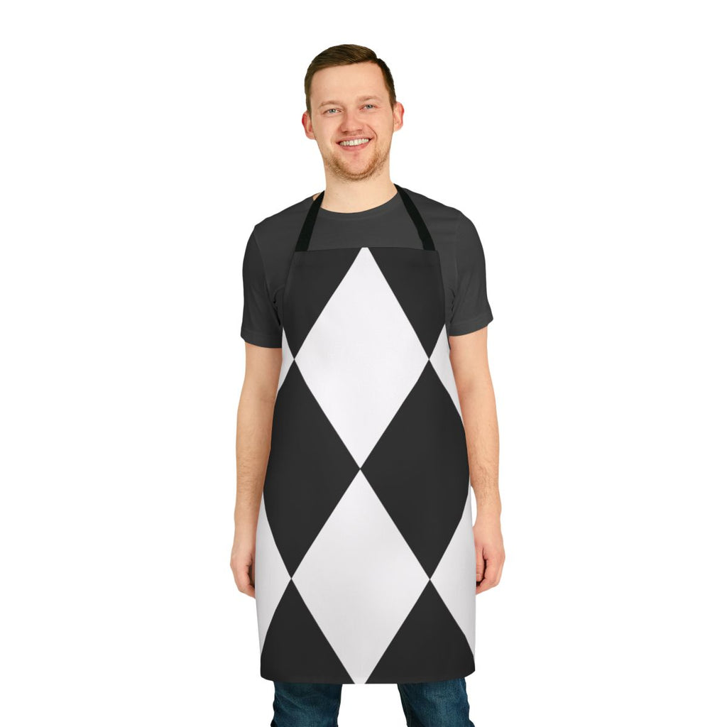 Black and white harlequin-style apron with a bold, geometric pattern
