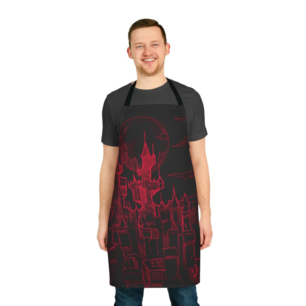 A striking red apron with a dark, menacing castle design, perfect for cooking or Halloween.