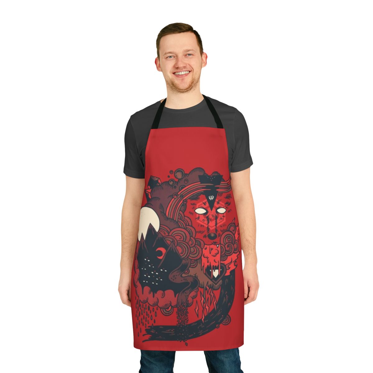 A stylized image of a wolf surrounded by moon, mountains, and other nature-themed elements on a high-quality apron.