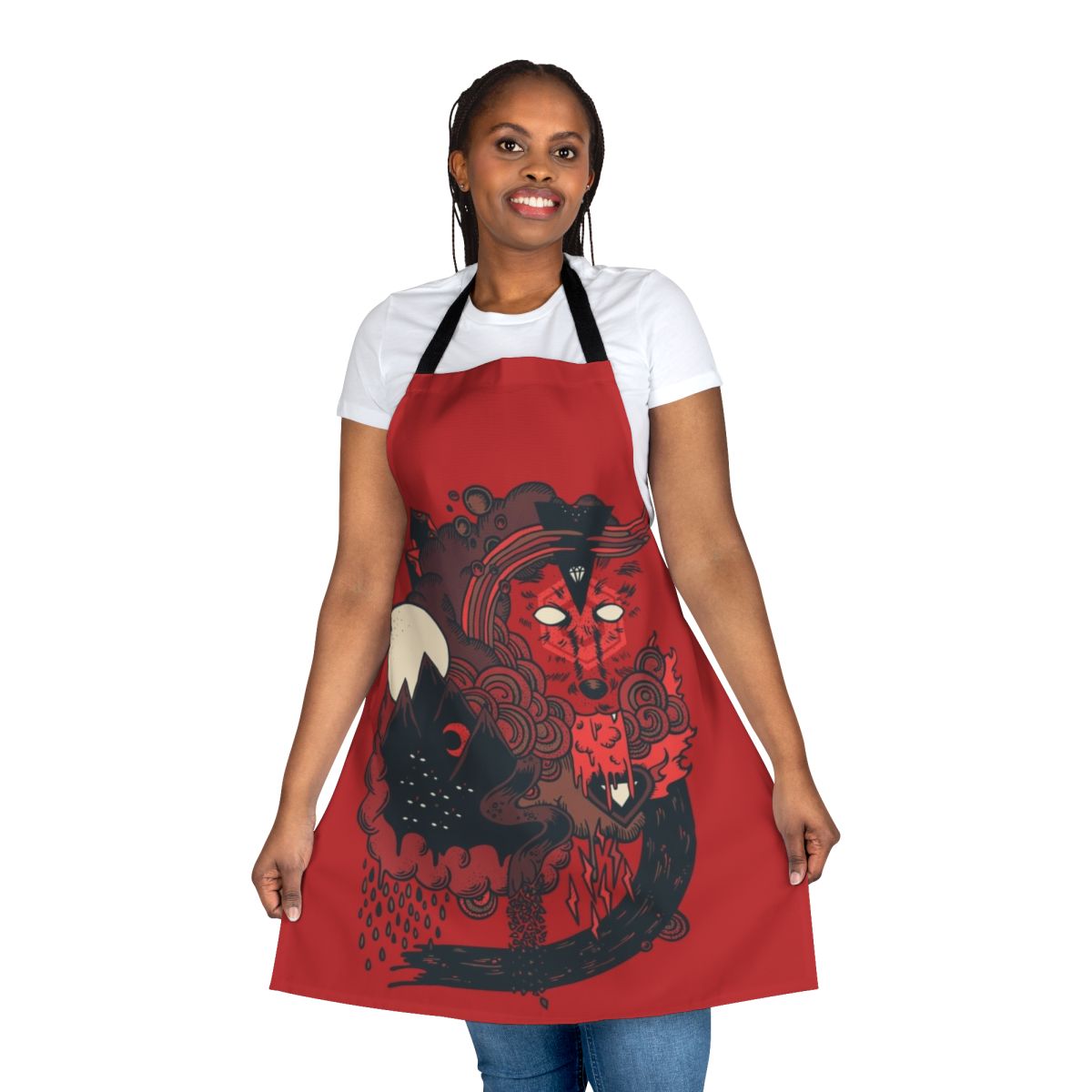 A stylized image of a wolf surrounded by moon, mountains, and other nature-themed elements on a high-quality apron.
