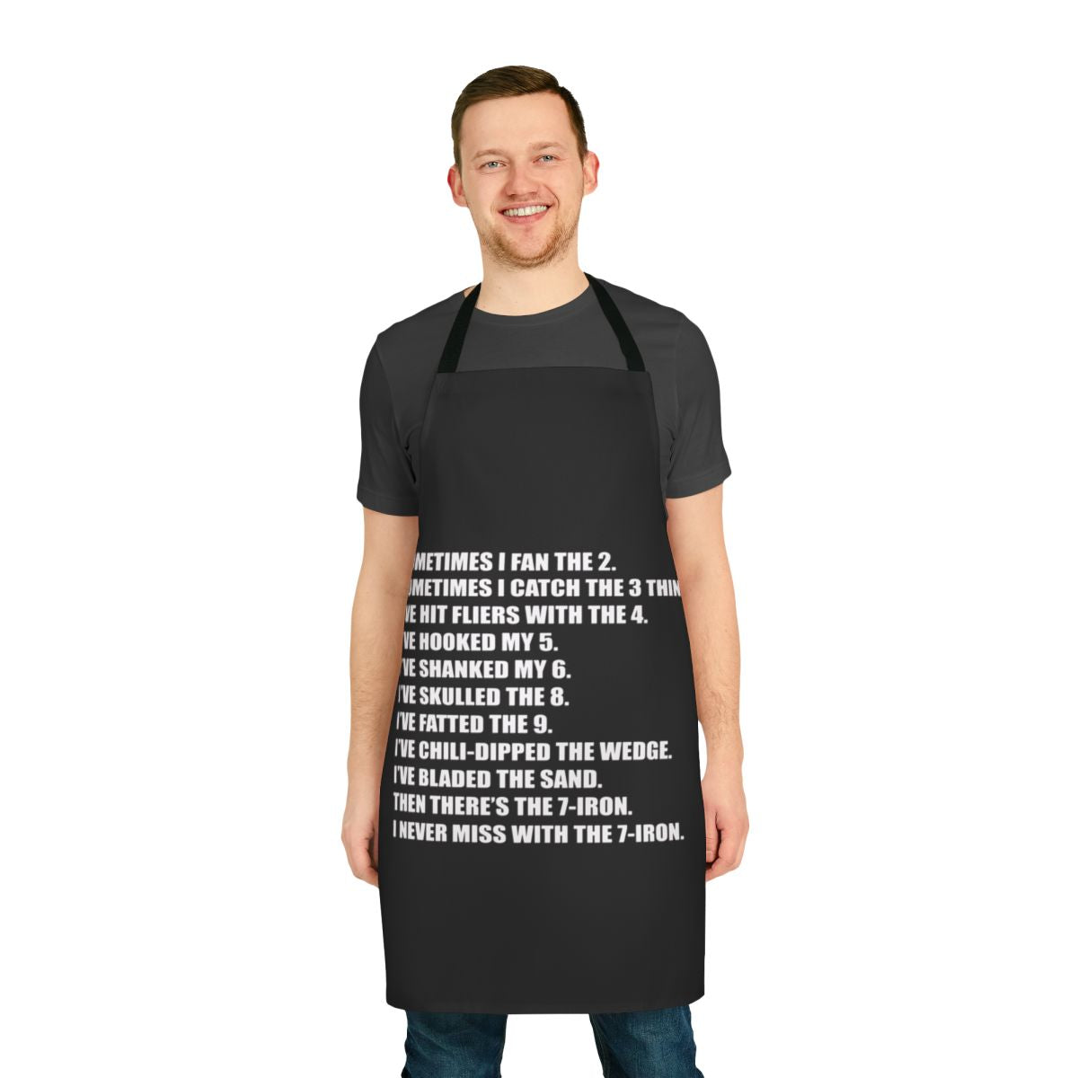 Golfer wearing a stylish 7 iron-inspired apron for cooking or grilling
