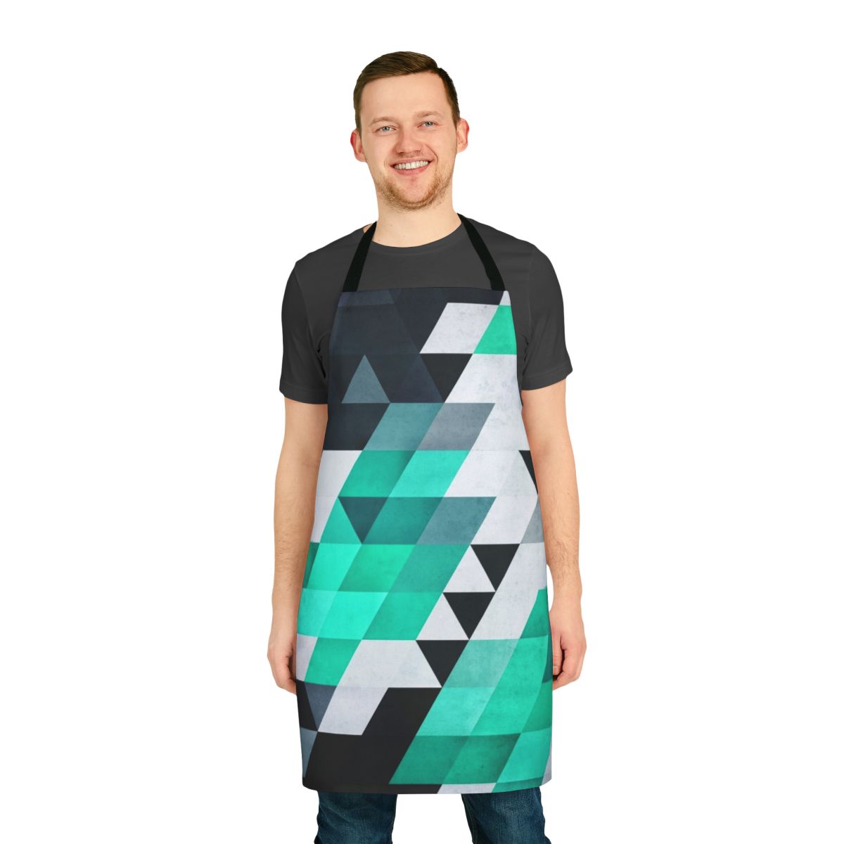 Teal, white, and black abstract geometric apron with an isometric design
