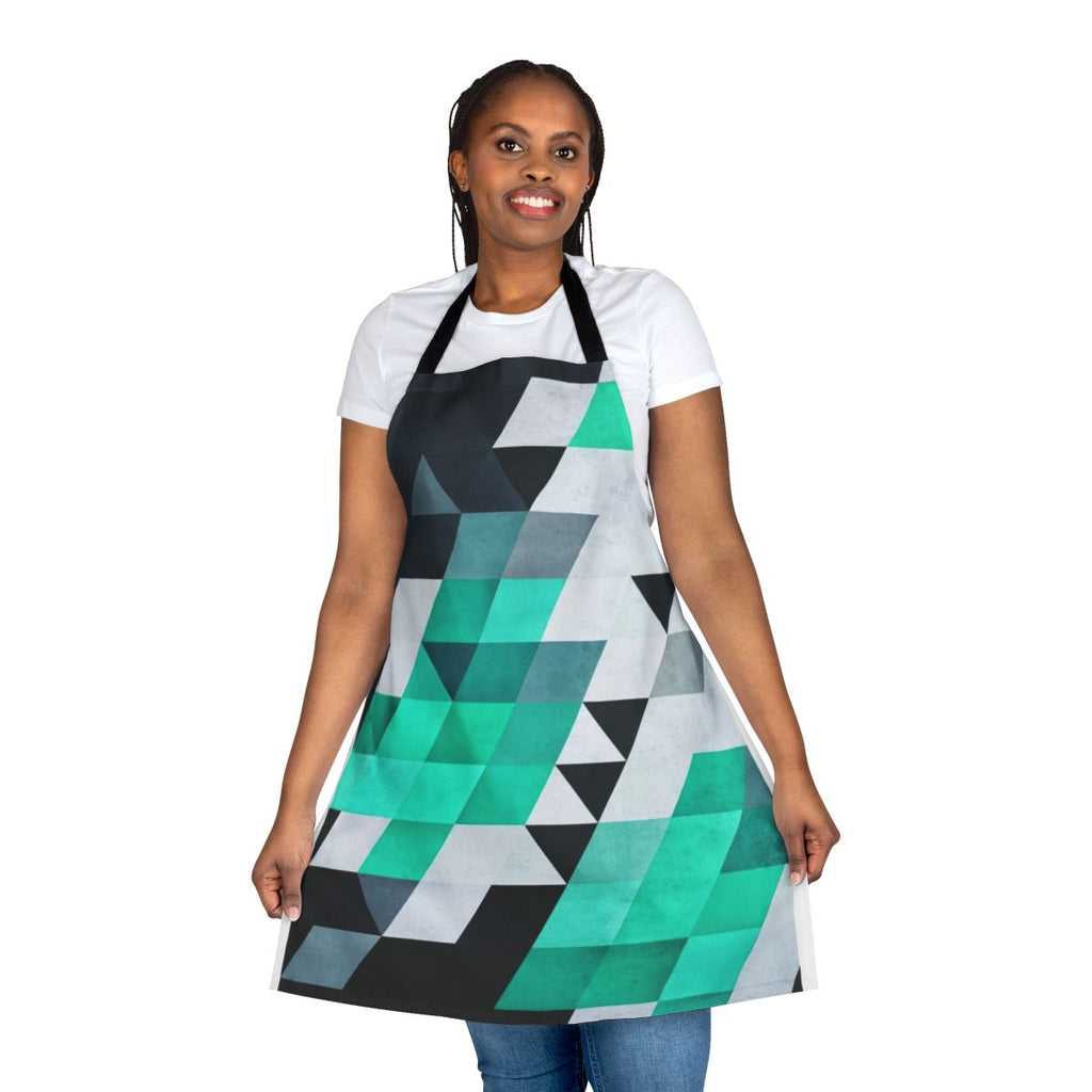 Teal, white, and black abstract geometric apron with an isometric design