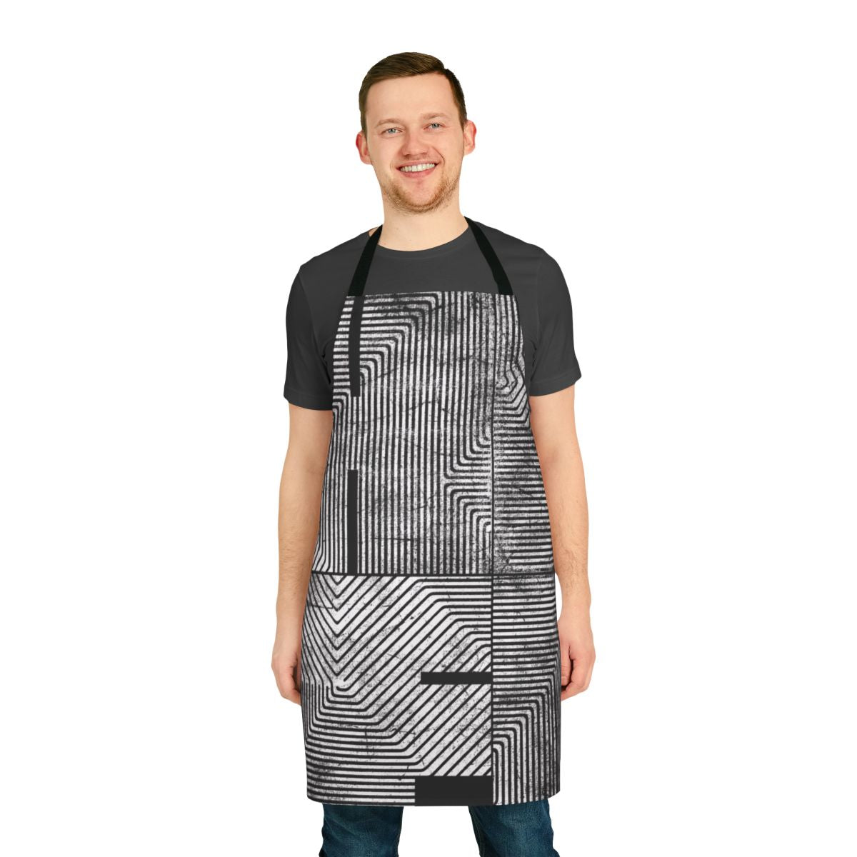 A black and white abstract geometric patterned apron, perfect for DJs, music fans, and party hosts.