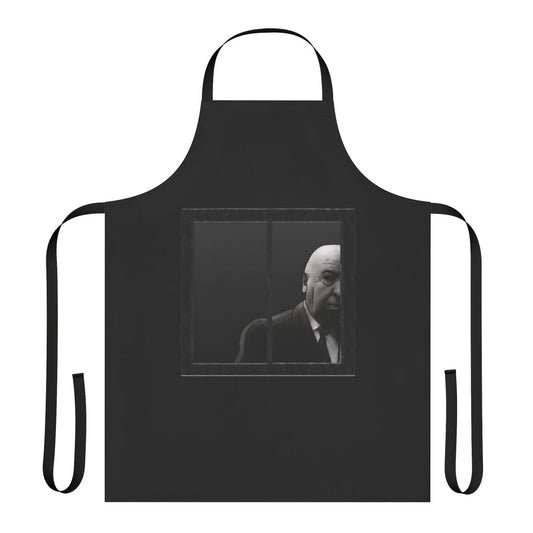 A black and white graphic apron featuring an illustration of the iconic director Alfred Hitchcock.