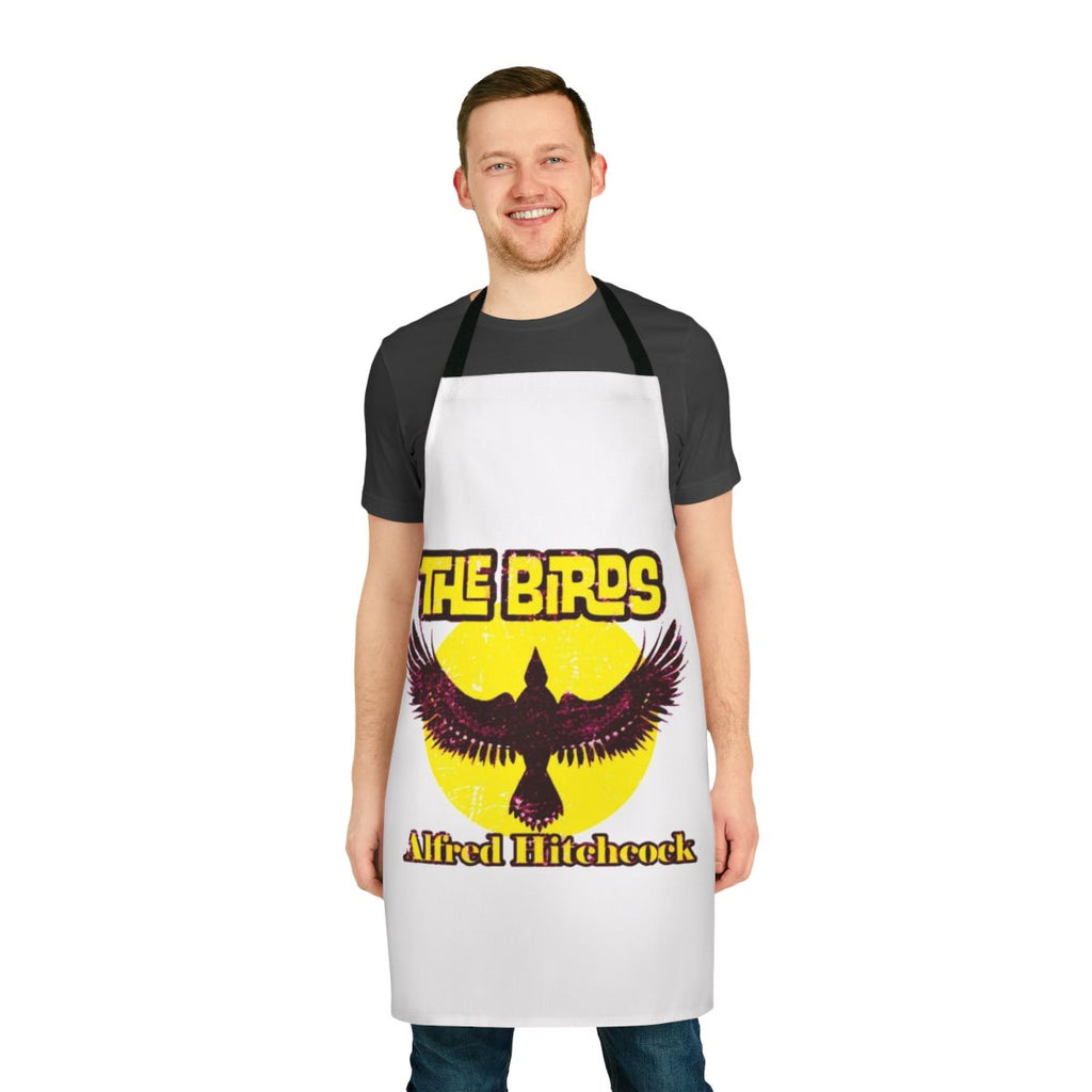 An apron featuring a stylized portrait of Alfred Hitchcock, the legendary film director, and a nod to his classic horror movie "The Birds".