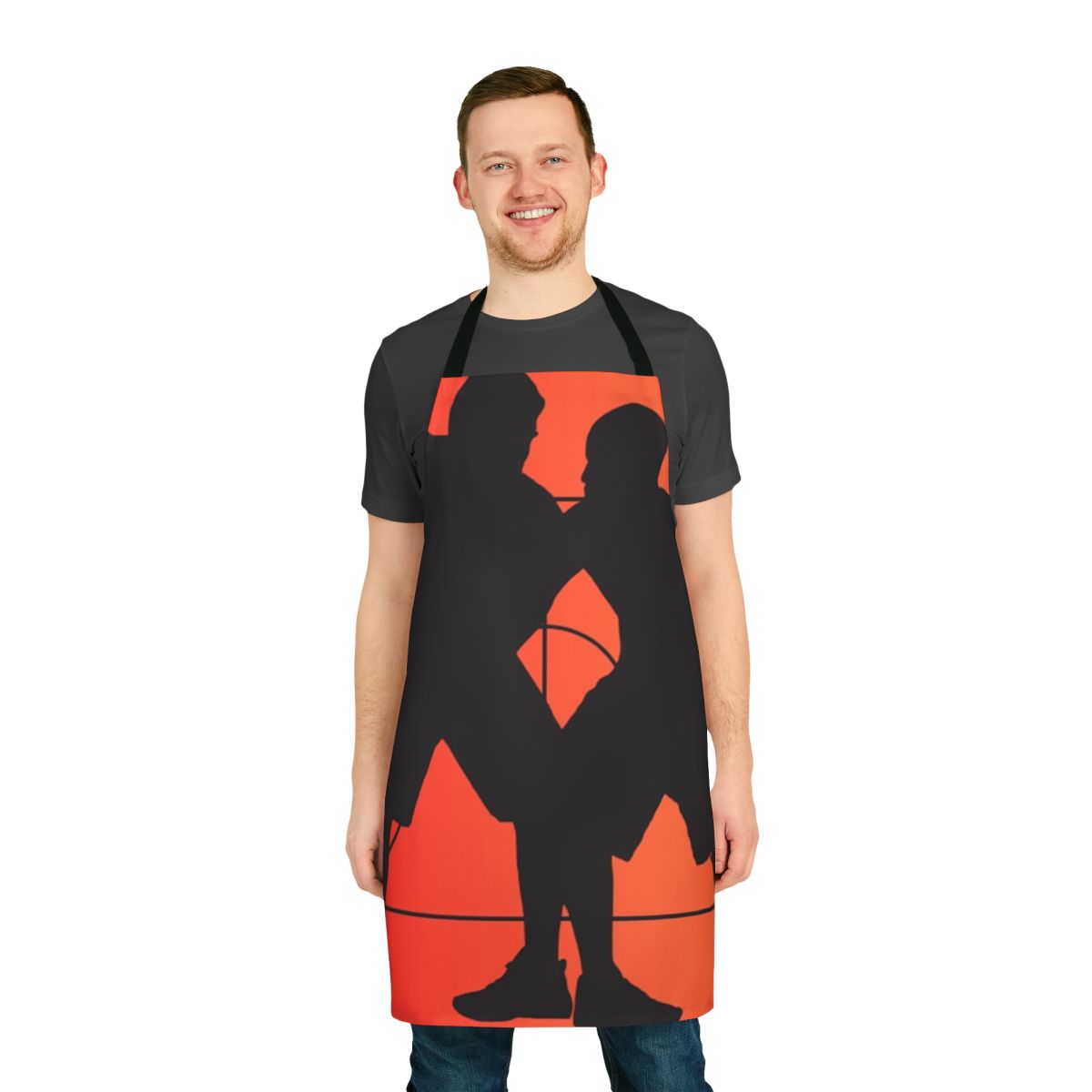 Colorful apron with musical notes, superheroes, and other fun patterns