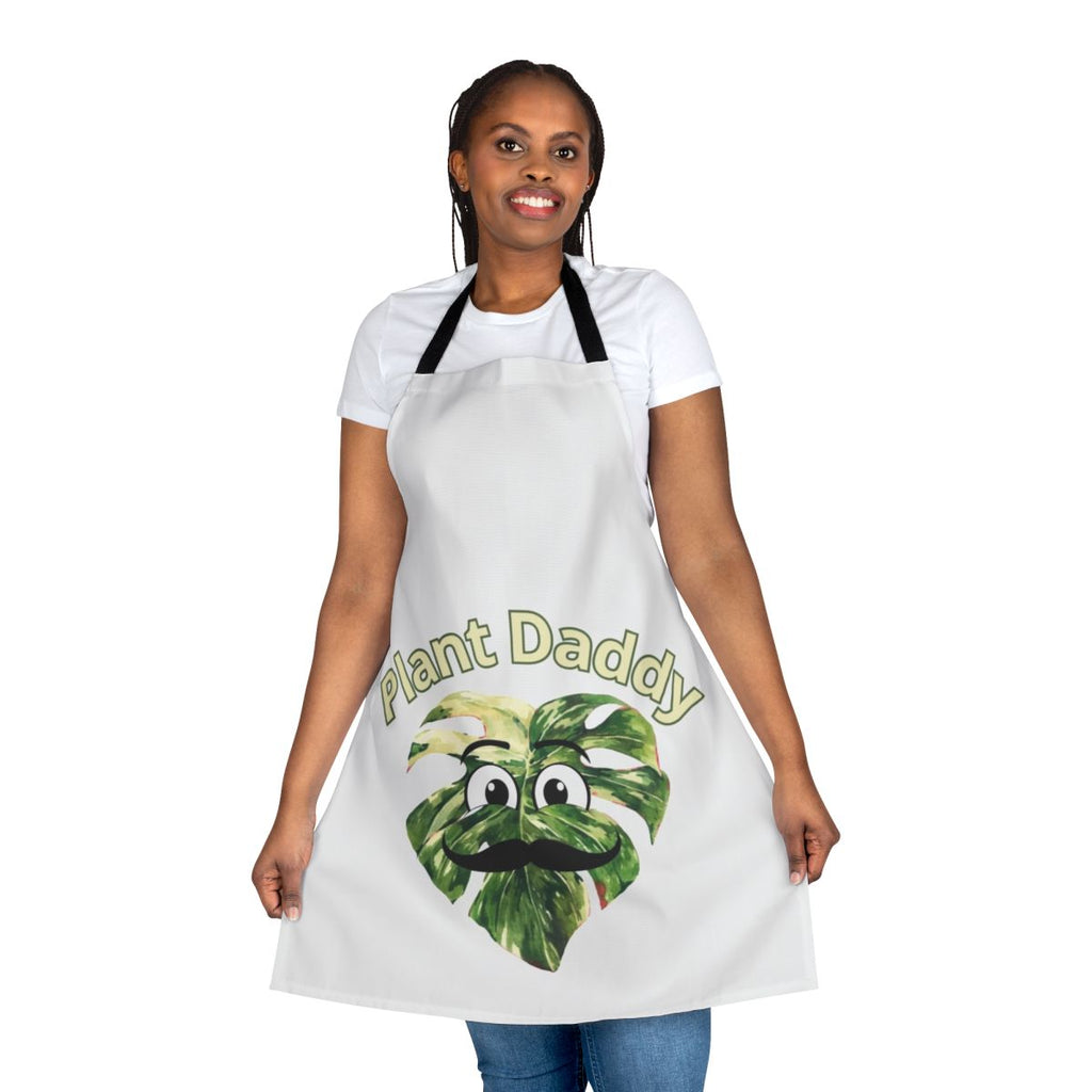 A vibrant apron featuring lush monstera leaves, perfect for plant lovers.