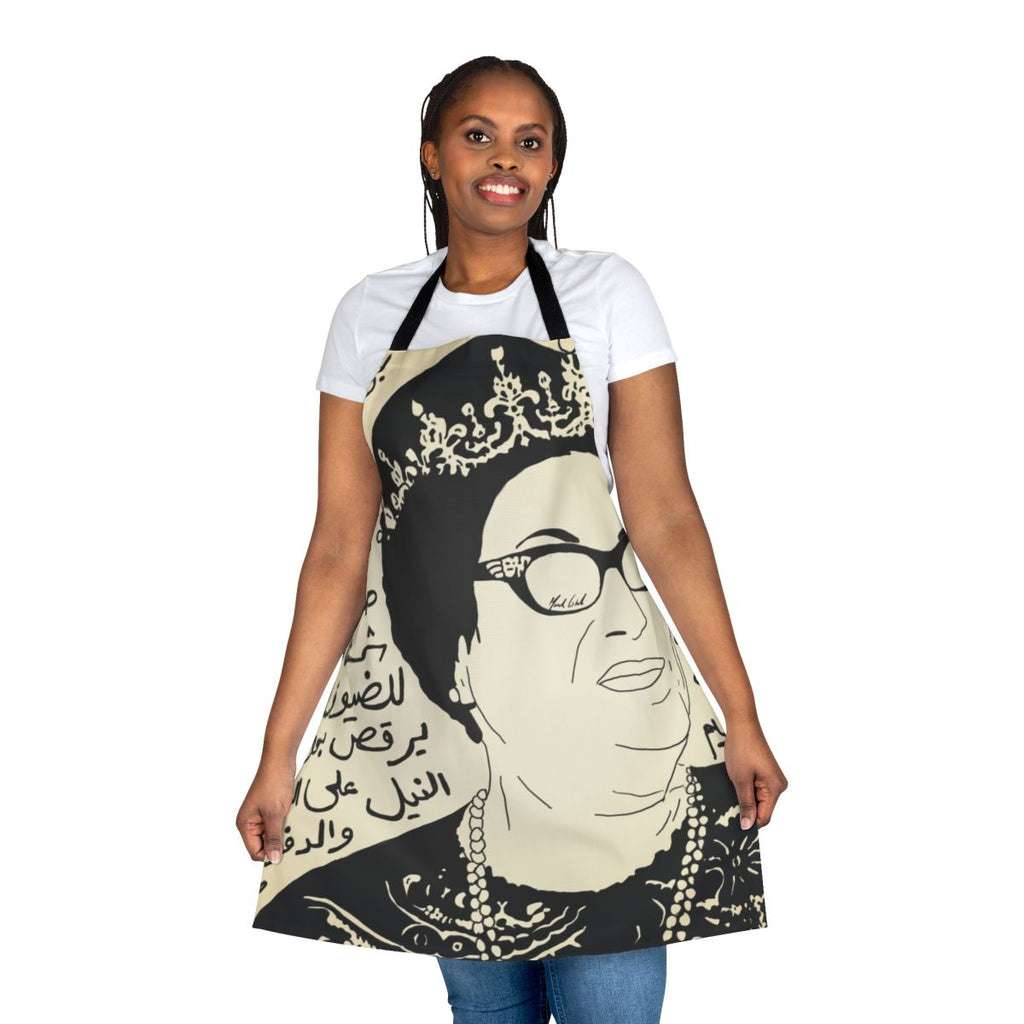 Stylish apron featuring vibrant pop art design inspired by renowned Arab singer Oum Kalthoum's iconic song "Toof W Shoof"