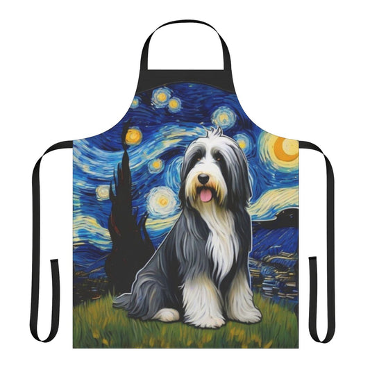 Bearded collie dog wearing a blue apron with a starry night pattern