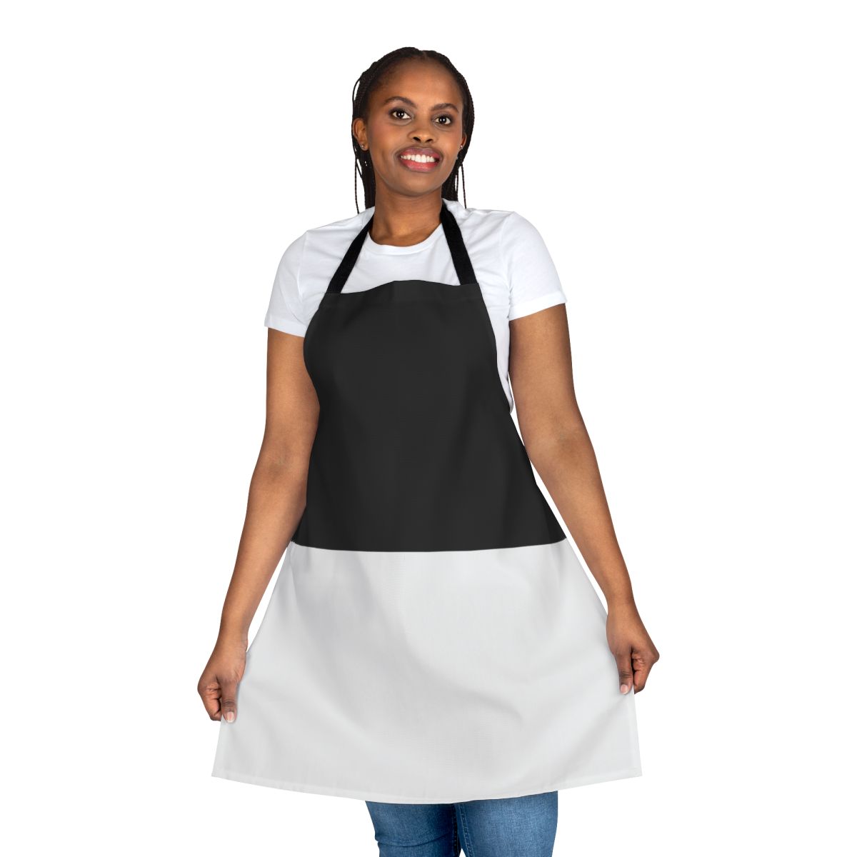 Photograph of a stylish black and white bicolor apron with a geometric design.