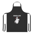 Fashionable black and white apron featuring a monster design, perfect for the kitchen