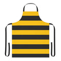 A black and yellow striped apron with a bold, stylized bee pattern design.
