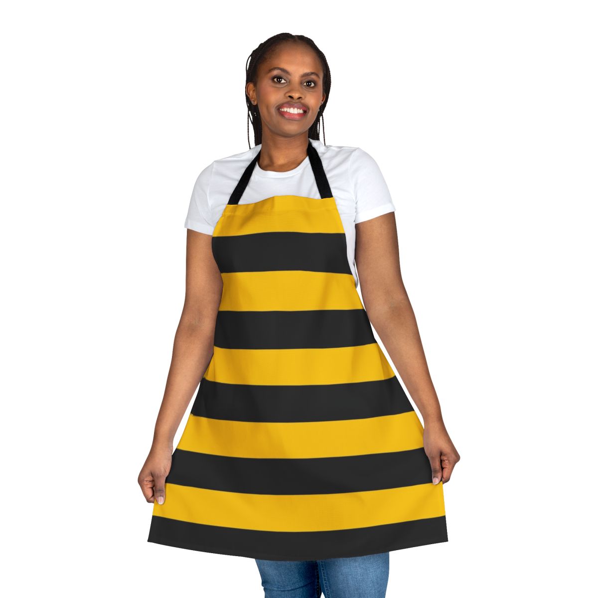 A black and yellow striped apron with a bold, stylized bee pattern design.