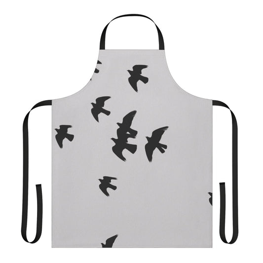 Stylish black apron featuring a design with birds, animals, and nature imagery