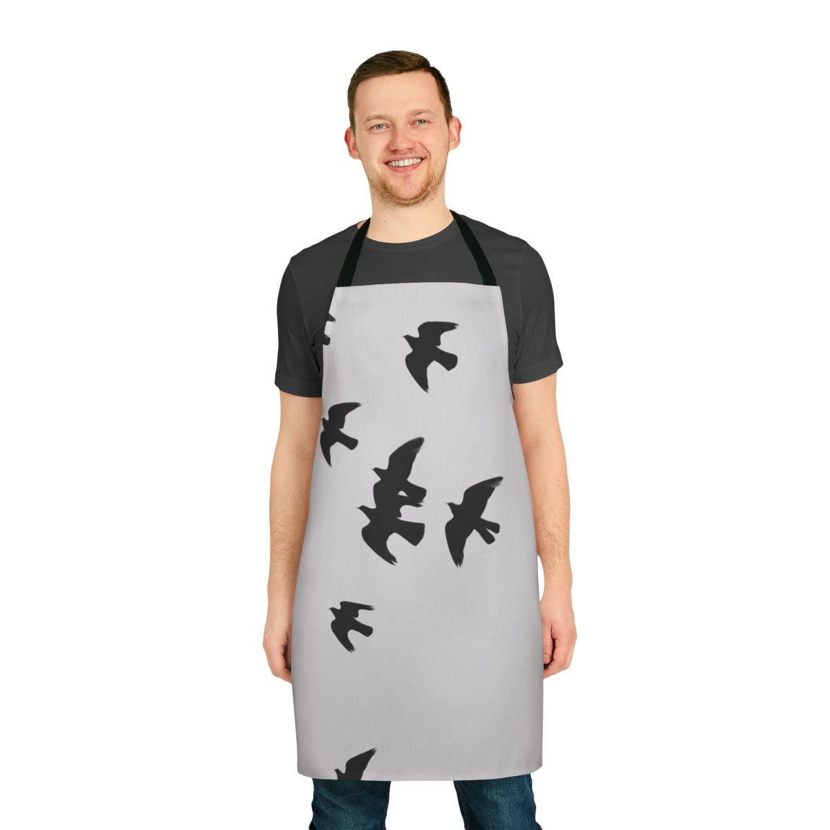 Stylish black apron featuring a design with birds, animals, and nature imagery