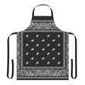 A black bandana-style apron with a trendy, urban design