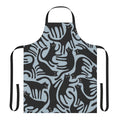 A modern black cat pattern printed on a blue apron, perfect for cat enthusiasts