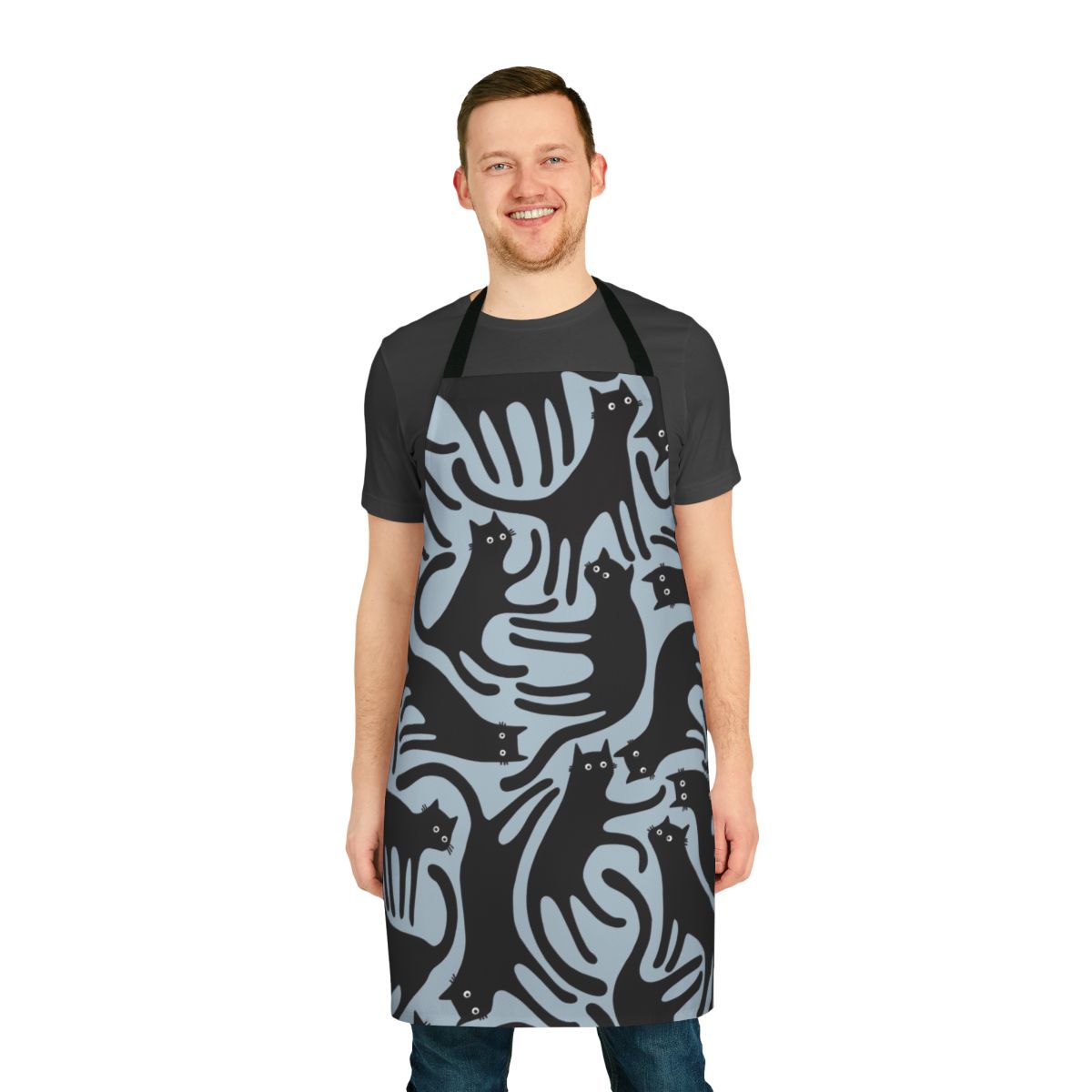 A modern black cat pattern printed on a blue apron, perfect for cat enthusiasts