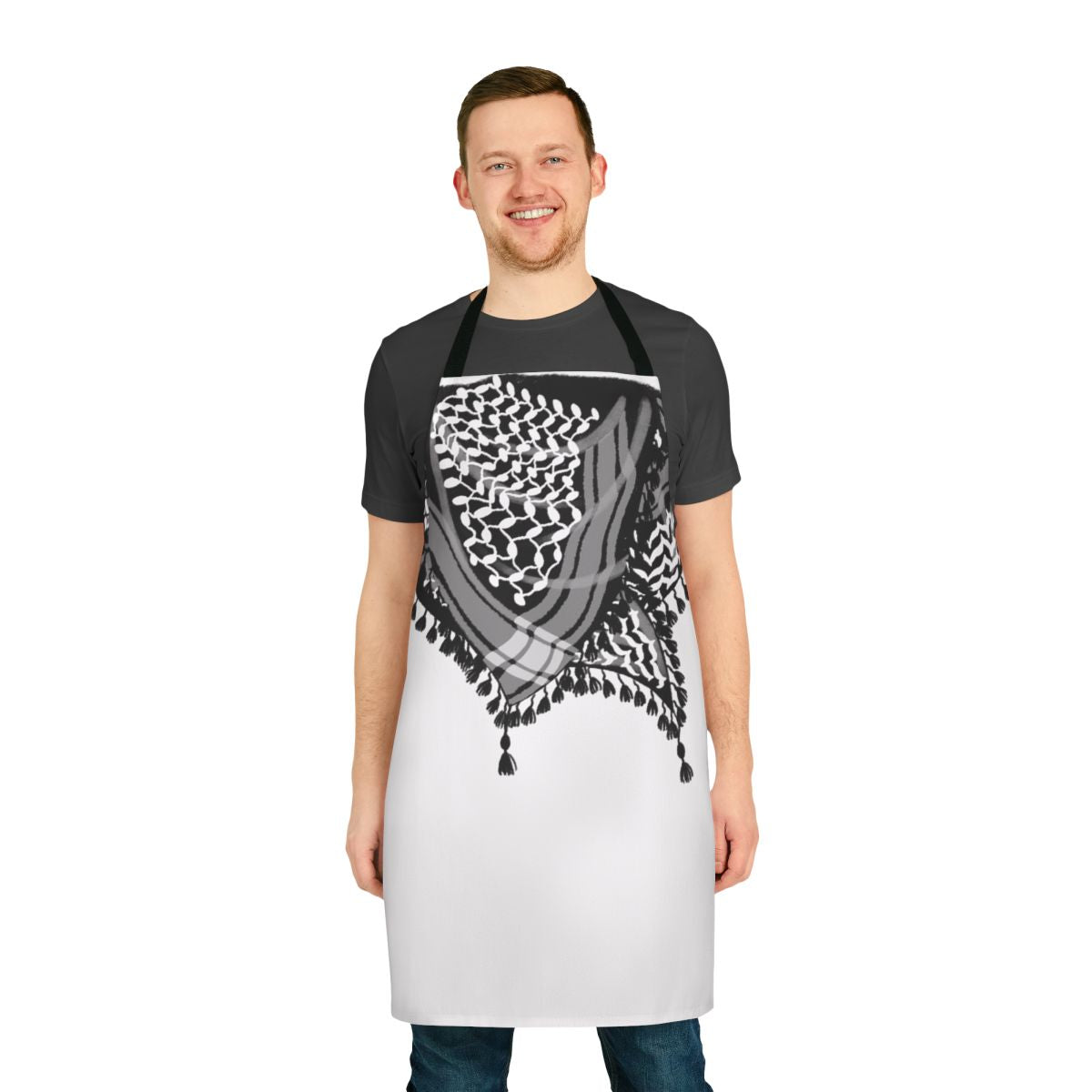 Black and white keffiyeh-patterned apron with tassels