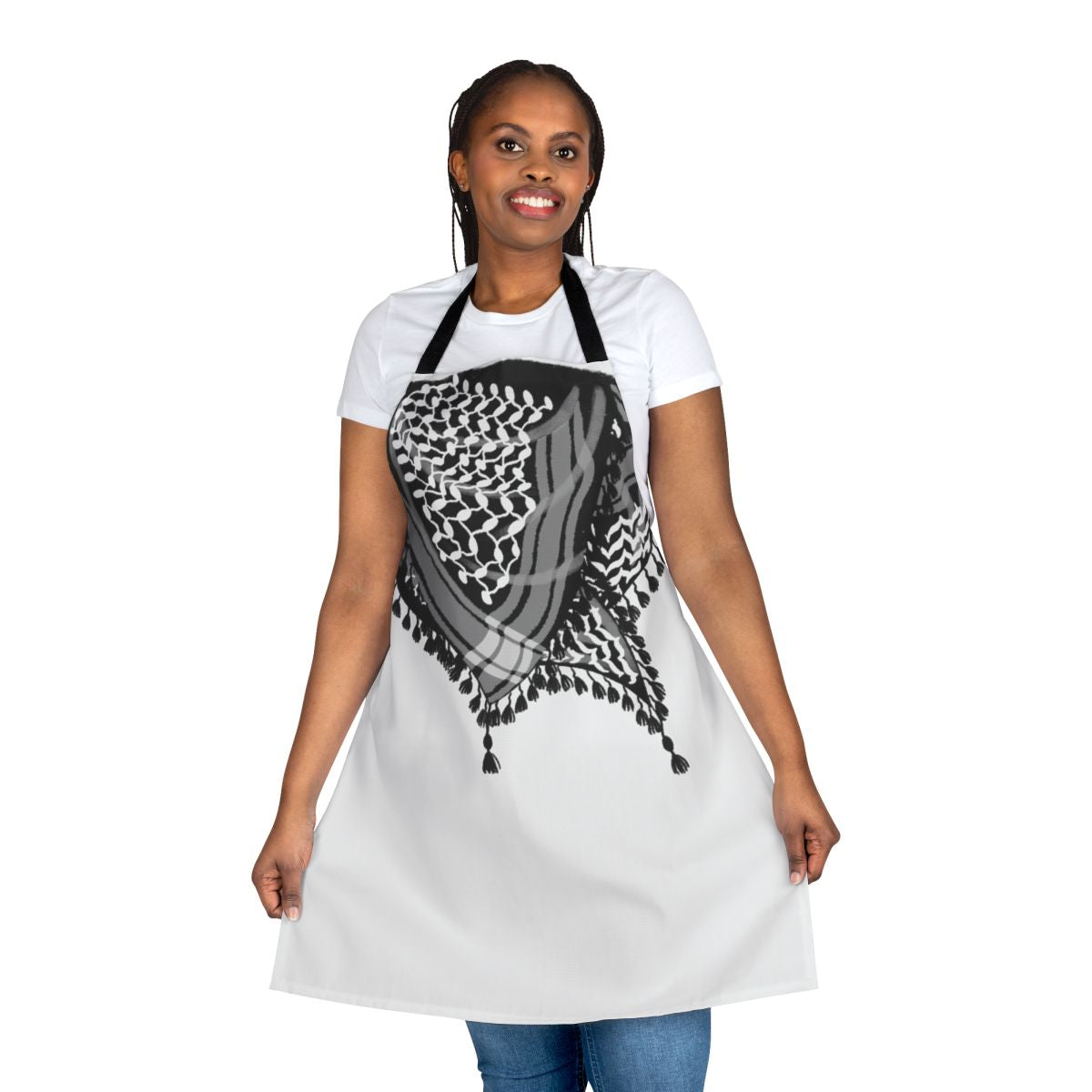 Black and white keffiyeh-patterned apron with tassels