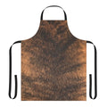 Brindle dog wearing a brown and tan brindle print apron