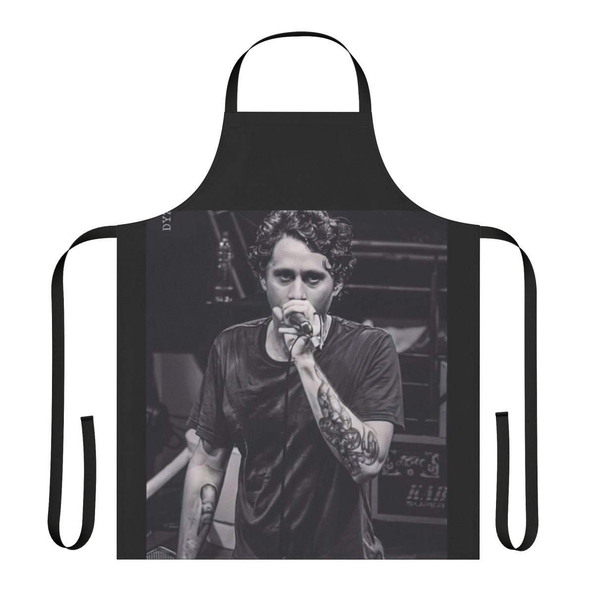 Canserbero-inspired black and white portrait design on a high-quality apron