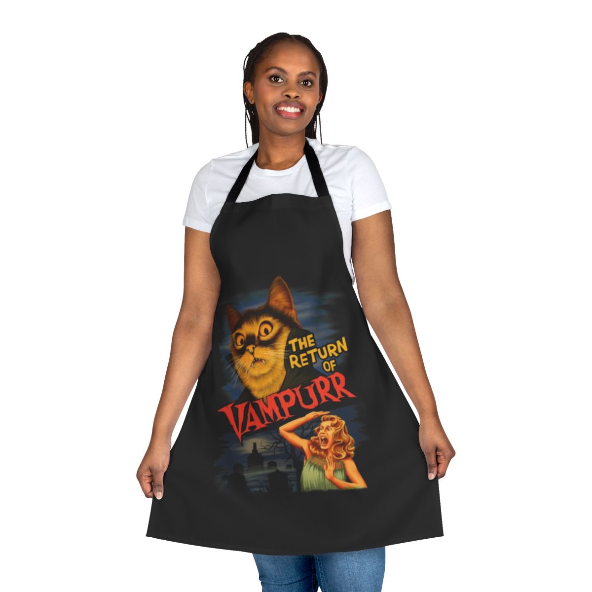 A black cat apron with the design "The Return of Vampurr"