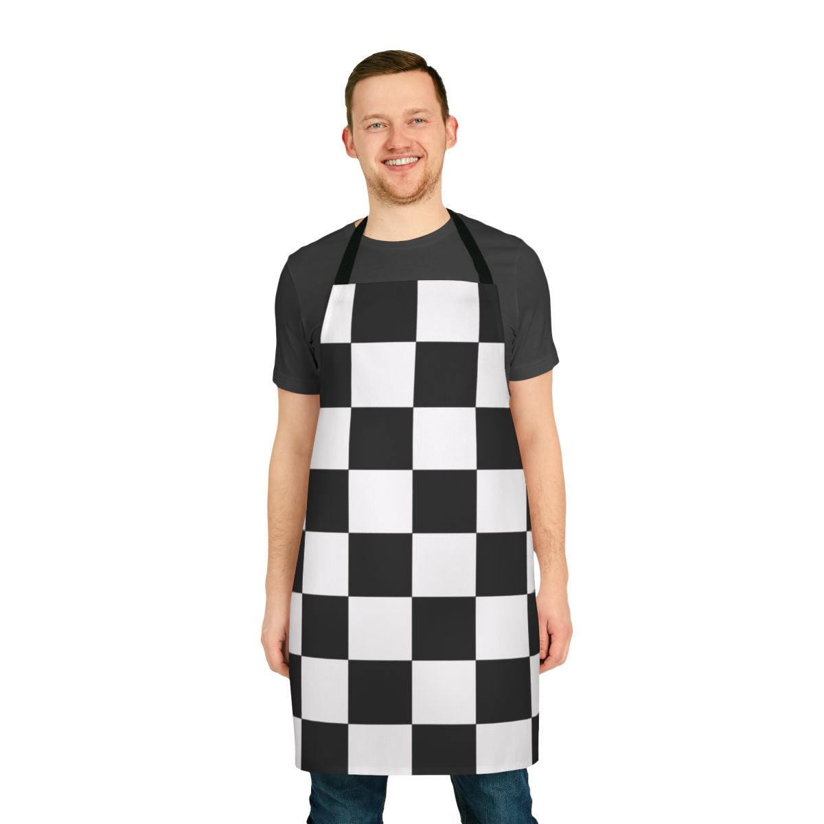 A black and white checkered or checkerboard pattern apron, a minimalist and geometric kitchen accessory.