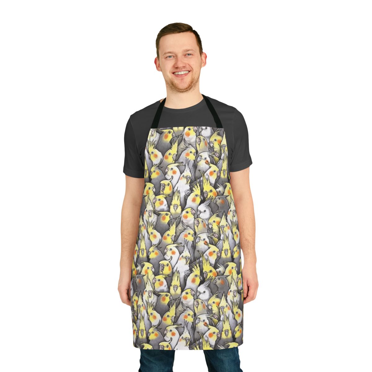 Colorful and whimsical apron featuring a pattern of cute cockatiels and other Australian birds.