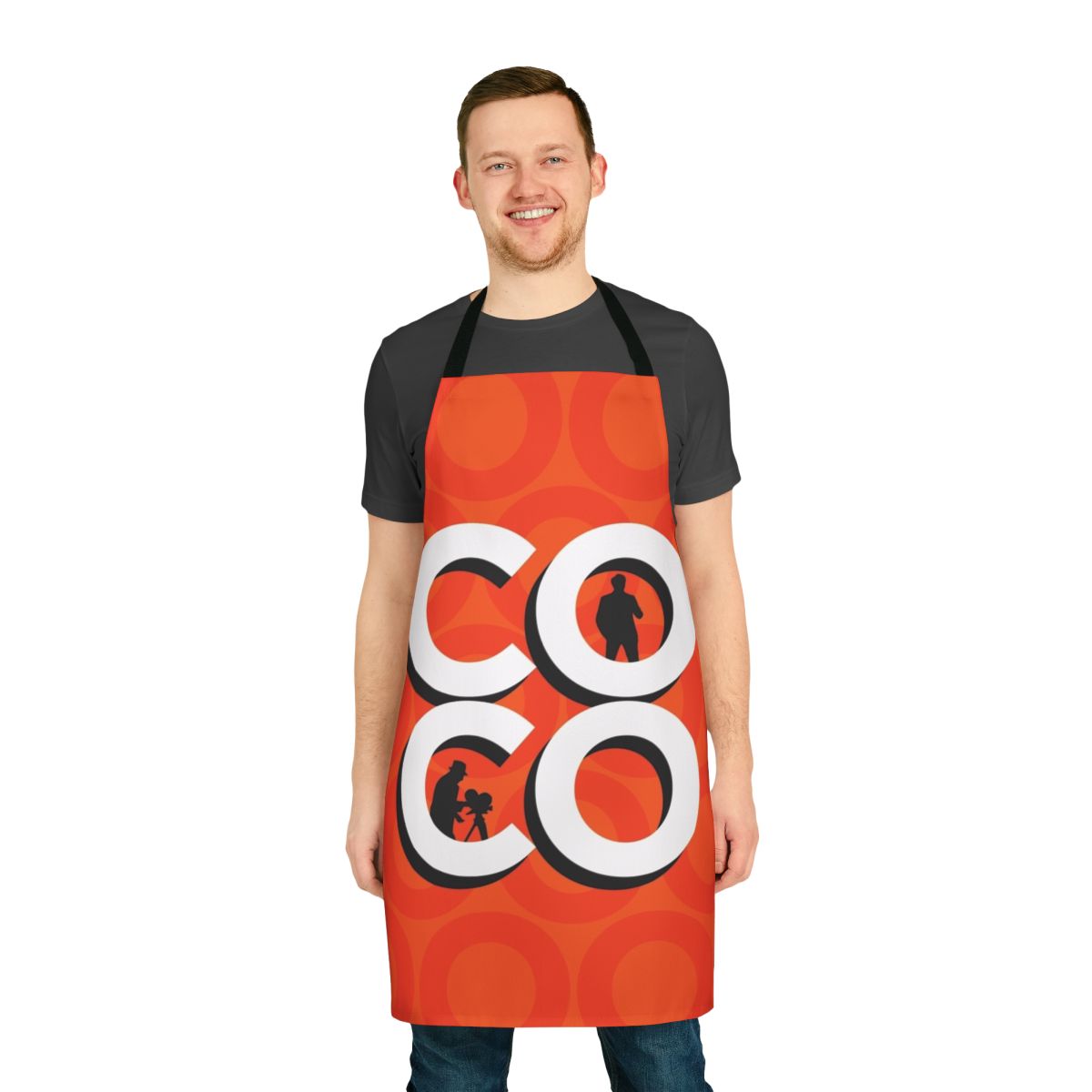 A high-quality apron featuring a stylized typography design with a Coco silhouette, perfect for Conan O'Brien fans.