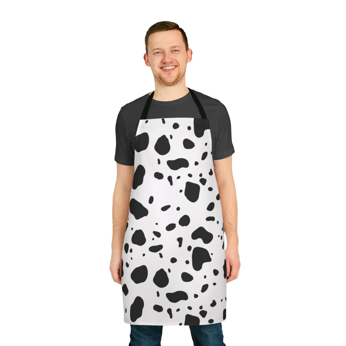 A black and white Dalmatian-patterned apron, perfect for the kitchen.